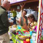 Photo by Kelly Sullivan/ Peninsula Clarion Lia Benner and Ava Grossl make a transaction at their lemonade stand, Saturday, June 14, in Soldotna.