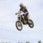 Photo by Kelly Sullivan/ Peninsula Clarion A rider takes a jump during the State Races, Saturday, at Twin City Raceway.