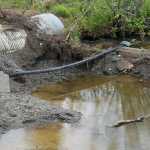 Photo by Dan Balmer/Peninsula Clarion High levels of groundwater has delayed the culvert replacement project on Beaver Loop Road that has pushed the completion timeline back three weeks before the section of road can be reopened.