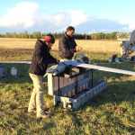 Photo courtesy Matt Parker Precision team members Charissa Moen and John Roman get the Insitu ScanEagle ready to deploy to fly the perimeter of the Funny River Wildfire, in Funny River.