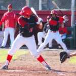 Photo by Kelly Sullivan/ Peninsula Clarion AJ Hernandez takes a swing, Thursday, June 19, at Oilers Park in Kenai.