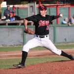 Photo by Kelly Sullivan/ Peninsula Clarion Chad Rieser throws a pitch at Friday's game.