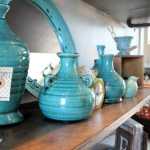 Orange Poppy owner Kenda Blanning offers home décor made by herself and her family as well and local artists' work at her store in Shops Around the Corner in Soldotna. Photo by Kaylee Osowski/Peninsula Clarion