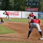 Photo by Dan Balmer/Peninsula Clarion Peninsula Oilers left fielder Jordan Sanford slides into second base on a ground ball hit by shortstop Mylz Jones in the fourth inning of their game against the Chugiak-Eagle River Chinooks at Coral Seymour Memorial Park.