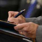 Photo by Rashah McChesney/Peninsula Clarion Alaska Governor Sean Parnell signed 11 bills into law Tuesday  July 7, 2014 during a joint chamber luncheon at the Soldotna Regional Sports Center.