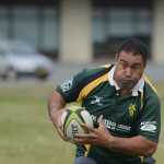 Photo by Rashah McChesney/Peninsula Clarion  Kenai River Wolfpack rugby player Will Schwenke breaks away and takes off during the Between the Tides Dipnet Tournament Saturday July 12, 2014 in Kenai, Alaska.
