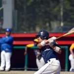 Photo by Rashah McChesney/Peninsula Clarion  Thomas Bowe swings during a Twins game against Bartlett Saturday July 19, 2014 in Kenai, Alaska.