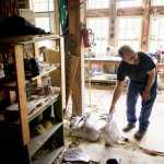 Artist John Coyne talks about his latest project May 22 in his studio in Iowa City. Coyne, a native of Fairbanks, Alaska, is crafting a series of metal sculptures for the Dena?ina Wellness Center in Kenai, Alaska. Through his research of Dena?ina culture, Coyne chose to combine the iconic birds with the tribe?s words.   Benjamin Roberts / Iowa City Press-Citizen Artist John Coyne talks about his latest project in his studio in Iowa City, IA, on Thursday, May 22, 2014. Coyne, a native of Fairbanks, AK, is currently crafting a series of metal sculptures resembling a Raven, a bird iconic to Alaska and the DenaÕina people, where the bird has a strong influence the culture's songs and poetry.