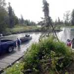 Photo by Rashah McChesney/Peninsula Clarion  The Eagle Rock boat launch saw moderately heavy use, primarily by personal-use fishermen launching to head downstream and fish Friday July 18, 2014 in Kenai, Alaska. The Alaska Department of Natural Resources - Division of Parks and Outdoor Recreation took over managment and operations of the boat launch and 2014 is its first season being state run.