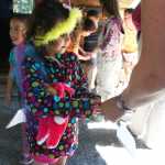 Photo by Kelly Sullivan/ Peninsula Clarion Aiden Hunt gets help putting together her nature diary from her mother Stephanie Hunt during the Family Explorer Program, Saturday, August 2, 2014, on the Keen-Eye Nature Trail in Soldotna.