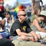 Photo by Rashah McChesney/Peninsula Clarion Jayme Carr hugs Meadow Carr, 6, as the two dance during a show at Salmonstock August 2, 2014 in Ninilchik, Alaska.