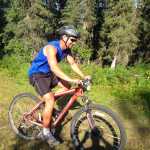 Contributed photo by Tsalteshi Trails Association Tony Eskelin finished fourth with a time of 28:05 during the fourth Salmon Cycle Series race Thursday July 31, 2014 on the Tsalteshi Trails in Soldotna, Alaska.
