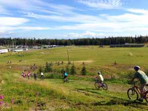 Contributed photo by Tsalteshi Trails Association The trails was packed during the fourth Salmon Cycle Series race Thursday July 31, 2014 on the Tsalteshi Trails in Soldotna, Alaska.