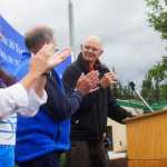 Photo by Kelly Sullivan/ Peninsula Clarion Jack Hummel, the first studnent to receive an associate of arts degree from the Kenai Peninsula Community College spoke at the Kenai Peninsula College, Kenai Peninsula Borough and Kenai Peninsula Borough School District joint 50th anniversary community barbecue, Thursday, August 14, at the KPC Kenai River Campus in Soldotna, Alaska.