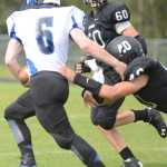 Photo by Kelly Sullivan/ Peninsula Clarion Fletcher Sebens number 6, Nathan Carstens number 40, Ben Carstens number 60