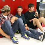 Photo by Kaylee Osowski/Peninsula Clarion From left seniors John Engen, Jonah Theisen and Wren Norwood chat in the hall before the bell rings for the first day of the 2014-2015 school year at Kenai Central High School on Tuesday.