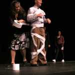 Photo by Dan Balmer/Peninsula Clarion Seventh grader Dylan Donham puts on his new sweatshirt during the first day of school at Skyview Middle School Tuesday. More than 400 students and 50 staff members were given the sweatshirt thanks to donations from the community. Students at Soldotna High School also received sweatshirts to start the year.
