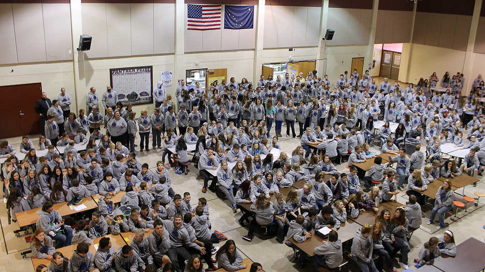 Photo by Kelly Sullivan/ Peninsula Clarion Justin Martin and Herman Cleveland play tetherball on the playground during their first recess of the new school year, at Nikiski North Star Elementary School, Tuesday, August 19, 2014, in Nikiski, Alaska.