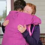 Photo by Dan Balmer/Peninsula Clarion Family of Rebecca Adams, one of the four missing since late May, gather Tuesday night for a candle light vigil at the Kenai New Life Assembly of God Church in Kenai. The family held the vigil to remind people who go out hunting in the woods to be on the lookout for any clues that could lead to the missing family's disappearance. From left, Dennis Gifford, Nova Gifford, Audre Gifford, Jeanine Adams and Pat Gifford.