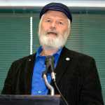 Photo by Dan Balmer/Peninsula Clarion Rep. Kurt Olson, R-Soldotna responds to a question from the audience at the State Legislature candidate forum Tuesday at the Soldotna Regional Sports Complex. Olson is running for re-election for District 30. To the left is his challenger Shauna Thornton, a Democrat from Kenai.