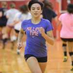 Kelly Sullivan/ Peninsula Clarion Kyla Whannell sprints across the gym, Thursday, August 29, 2014, during the Kenai Central High School girls varsity volley ball practice, at Kenai Central High School, in Kenai, Alaska.