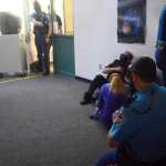 Photo by Kelly Sullivan/ Peninsula Clarion Alaska State Trooper Blake Calhoun roleplays an armed shooter during a lockdown drill for the local two-day ALICE Training Institute training for Kenai Peninsula municipal officers and Alaska State Troopers, Friday, August 29, 2014 at the Challenger Learning Center of Alaska in Kenai, Alaska.