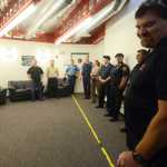 Photo by Kelly Sullivan/ Peninsula Clarion Greg Crane, who co-founded the ALICE Training Institute with his wife LIsa Crane, address Friday's group of Kenai Peninsula municipal officers and Alaska State Troopers, Friday, August 29, 2014 at the Challenger Learning Center of Alaska in Kenai, Alaska.