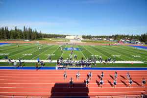 Photo by Kelly Sullivan/ Peninsula Clarion Soldotna High Schools kicks off the first game on the new track and field , Saturday, August 30, 2014 during the varsity game against Thunder Mountain high school at Soldotna High School in Soldotna, Alaska.