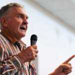 Photo by Rashah McChesney/Peninsula Clarion  Kenai Peninsula Borough Mayoral candidate Carrol Martin answers a question during a joint Kenai and Soldotna Chambers of Commerce luncheon forum Wednesday September 3, 2014 in Kenai, Alaska.