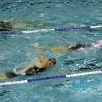 Photo by Dan Balmer/Peninsula Clarion Athletes swim 500 meters for the first leg of the Tri the Kenai triathlon race Sunday at Skyview Middle School.