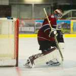 Photo by Kelly Sullivan/ Peninsula Clarion Fairbanks Ice Dogs' goalie Patrick Munson misses a puck, Friday, September 12, 2014, at the Soldotna Regional Sports Complex in Soldotna, Alaska.