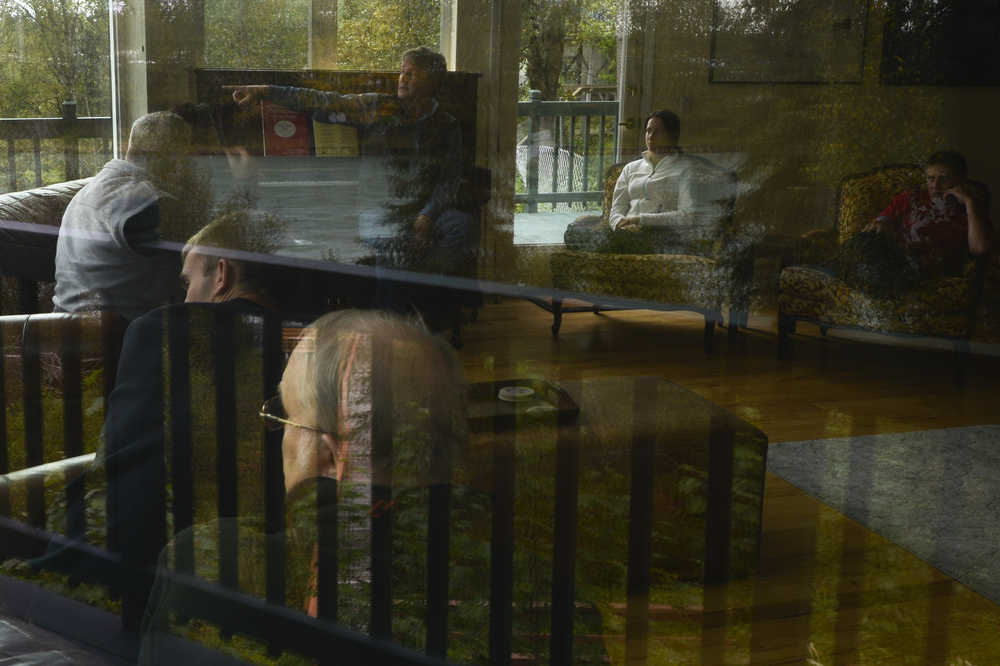 Photo by Rashah McChesney/Peninsula Clarion  Several Russian delegates on an exchange trip to Alaska with the Oregon-based Wild Salmon Center, listen to Ricky Gease, executive director of the Kenai River Sportfishing Association, talk about issues of salmon management and habitat September 10, 2014 in Soldotna, Alaska.