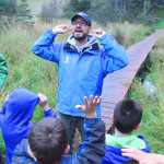 Photo by Kelly Sullivan/ Peninsula Clarion Kenai Watershed Forum's Educational Specialist Dan Pascucci took the students of Sara Boersma and Robyn Zinszer at the Kaleidoscope School of Arts and Science for a walk on the Shqui Tsatnu Creek Trails, Wednesday, September 17, 2014 in Kenai, Alaska.