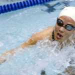 Photo by Rashah McChesney/Peninsula Clarion Soldotna's Alex Weeks finishes during a 50-yard breaststroke competition Friday September 19, 2014 during the Sohi Pentathalon in Soldotna, Alaska.