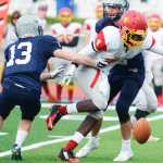 Photo by Kelly Sullivan/ Peninsula Clarion Soldotna Stars Dylan Ackerman tackles Faribanks' West Valley Wolf Pack's Dv'nn Cooks, Saturday, September 27, 2014 at Soldotna High School in Soldotna, Alaska.