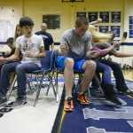 Photo by Rashah McChesney/Peninsula Clarion A game of musical chairs gets rambunctious Thursday Sept. 25, 2013 during homecoming festivities at Soldotna High School in Soldotna, Alaska.