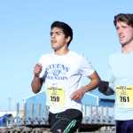 Pedro Ochoa (left), of Homer, and Allan Spangler, of Anchorage, run the half marathon during the Kenai River Marathon in Kenai on Sunday.  Photo by Kaylee Osowski/Peninsula Clarion