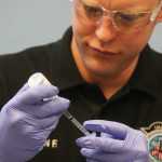 Photo by Kelly Sullivan/ Peninsula Clarion Darren Finley fills a needle with a small dose of insulin before he practices injecting himself in the stomach, Monday, September 29, 2014, at the Kenai Peninsula College in Soldotna, Alaska.