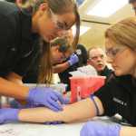 Photo by Kelly Sullivan/ Peninsula Clarion This year's Paramedic Technology students practiced intramuscular, intravenous and subcutaneous injections on their peers Monday, September 29, 2014, at the Kenai Peninsula College in Soldotna, Alaska.