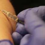 Photo by Kelly Sullivan/ Peninsula Clarion Becca Satathite practices intravenous injections on classmate Jessica Roper, Monday, September 29, 2014, at the Kenai Peninsula College in Soldotna, Alaska.