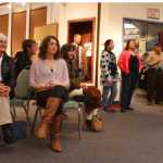 Photo by Kelly Sullivan/ Peninsula Clarion Visitors attended the opening reception at the Voices of the Wilderness travelling art show that opened at the Kenai Visitors and Cultural Center, part of the Kenai Wildlife Refuge's yearlong celebration of the 50th Anniversary of the Wilderness Act, Friday, October 3, 2014, at the Kenai Visitor and Cultural Center in Kenai, Alaska.