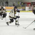Photo by Rashah McChesney/Peninsula Clarion  Kenai River Brown Bears forward Matt Wikman looks for an opening during a game against the Minot, North Dakota Minotauros Friday October 3, 2014 in Soldotna, Alaska. The Bears won the game 2-1 in a shootout.