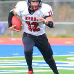 Photo by Kelly Sullivan/ Peninsula Clarion Kenai Kardinals' Jace Baker has control of the ball and starts to sprint down the field, Saturday, October 4, 2014, at Soldotna High School in Soldotna, Alaska.