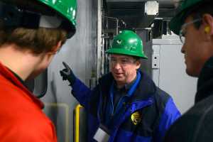 Photo by Rashah McChesney/Peninsula Clarion Jim Kingrey, power plant superintendent for the Homer Electric Association, gives a tour of the company's Soldotna Combustion Turbine Plant Wednesday October 8, 2014 in Soldotna, Alaska.