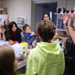 Photo by Dan Balmer/Peninsula Clarion Kenai school resource officer Alex Prins shows Cindy Hurst's fifth grade class from Kaleidoscope School of Arts and Science how police officers take fingerprints during a field trip to the Kenai Police Department Monday, Oct. 6, 2014.