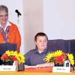Photo by Dan Balmer/ Peninsula Clarion Kenai Mayor Pat Porter watches as Kaleidoscope students Issac Erwin, Caden Fields and Cloey Followell from Julie Stephen's fifth and sixth grade class participate in a mock city council meeting Monday, Oct. 6, 2014 at Kenai City Hall.
