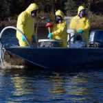 Photo by Rashah McChesney/Peninsula Clarion  Several agencies teamed up with the Alaska Department of Fish and Game as it treated four lakes in the Soldotna Creek drainage during the second week of October. Here, researchers mix the fish-killing rotenone before it is pumped into East Mackey Lake on Wednesday October 8, 2014 in Soldotna, Alaska.