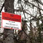 Photo by Rashah McChesney/Peninsula Clarion The Alaska LNG project has acquired, or is in the process of acquiring, several hundred acres of land in Nikiski where the group plans to build a facility at the terminus of a pipeline that would move natural gas from the North Slope to Nikiski for export. Here, land near Autumn Road has been labeled with several "No Trespassing" signs, Thursday October 9, 2014 in Nikiski, Alaska.