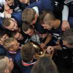 SoHi team members with the championship trophy.  Photo for the Clarion by Michael Dinneen