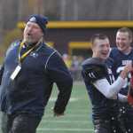 SoHi head coach Galen Brantley Jr. is doused by Brooks Furlong (11) as the game winds down.  Photo for the Clarion by Michael Dinneen